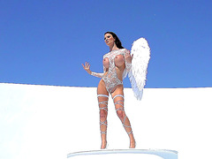 Angelic brunette Jasmine Jae showing her tits off in a desert