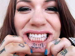 Tattooed tease Karmen Karma gets her ass sniffed in a bikini