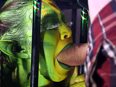 Eva Parcker and Tiffany Doll suck cock between the bars of a cage